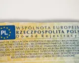 Fragment dowodu rejestracyjnego z napisem "Dowód Rejestracyjny" i symbolem PL. Numer VIN w dowodzie jest kluczowy.