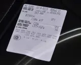 Naklejka z danymi pojazdu Skoda Octavia, zawiera m.in. numer silnika CZDA.
