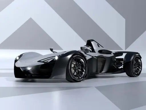 Srebrno-czarny, futurystyczny bolid BAC Mono z ostrymi liniami i aerodynamicznym kształtem, gotowy do wyścigu.