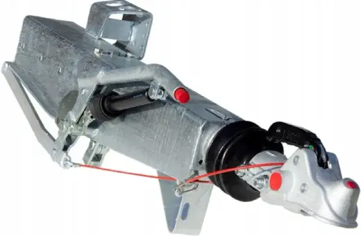 Metalowy hamulec najazdowy do przyczepy, z mechanizmem i zaczepem kulowym.